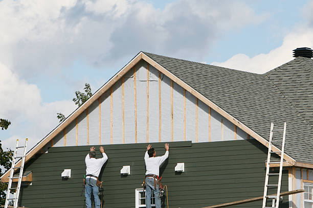Professional Siding Replacement technician working in Berthoud, CO